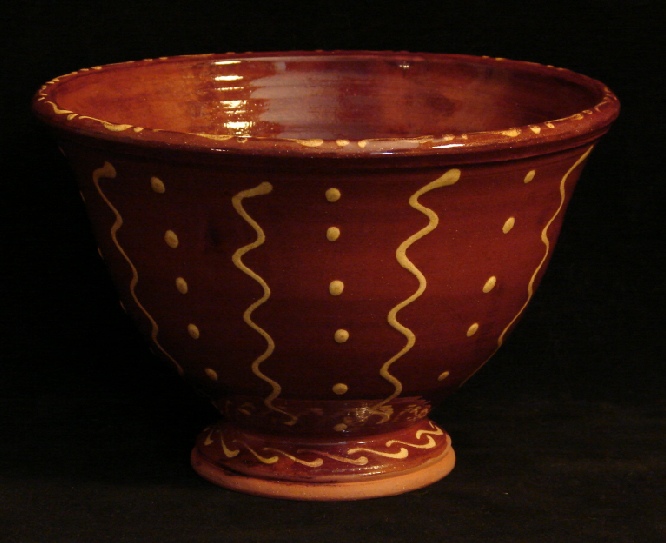 redware fruit bowl, squiggles and dots pattern