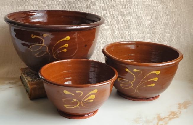 redware nesting set, feather motif